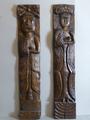 33. An unusual pair of antique carved oak panels..